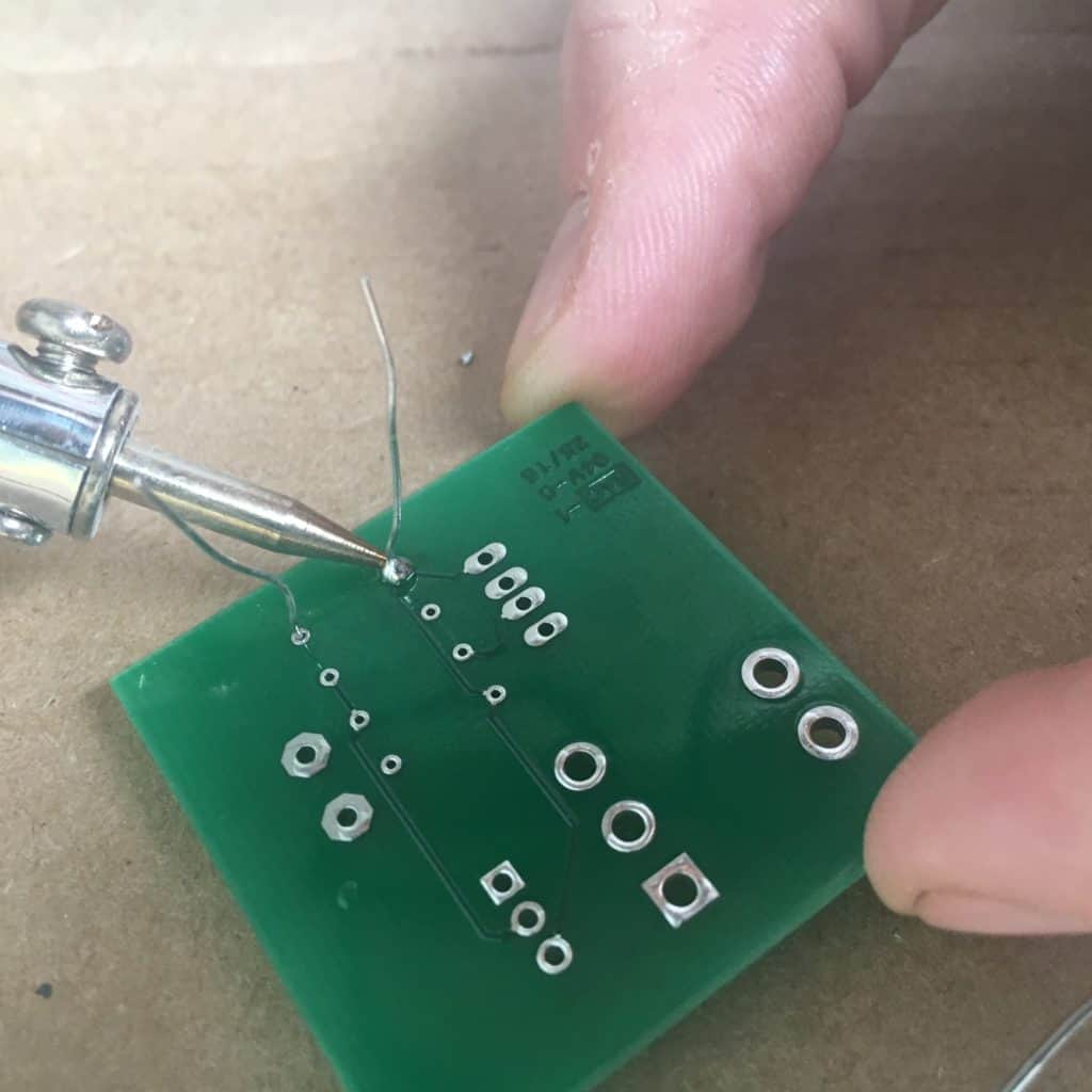soldering a resistor leg